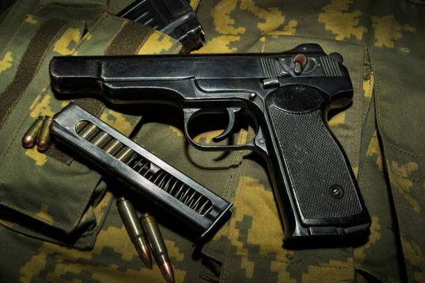 istock Soviet automatic 9mm pistol and cartridges with magazine. 2191064559