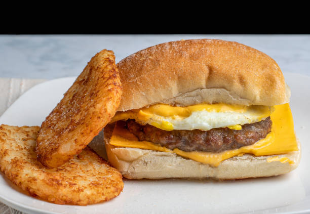 istock sausage patty fried egg , and cheese breakfast sandwich 2191071550