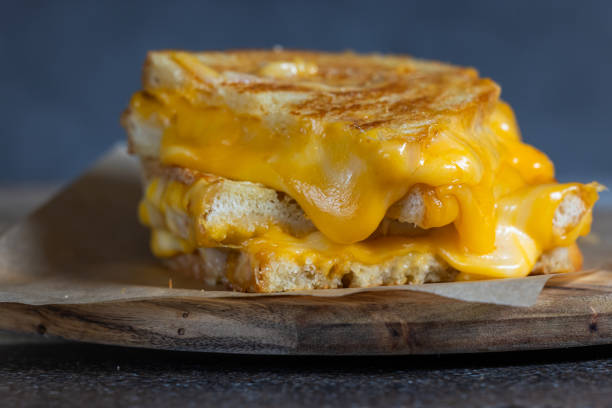istock Grilled Cheese with melting cheese dripping from the inside 2191076042