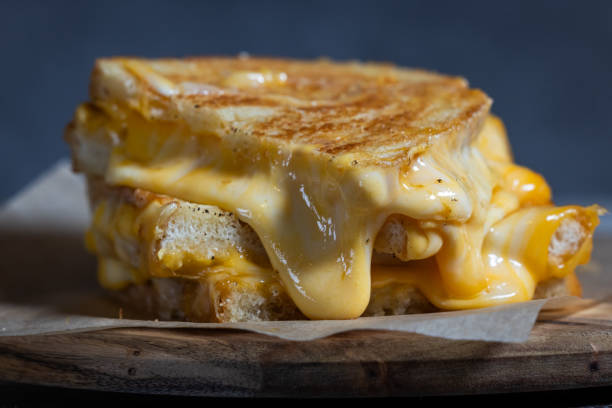 istock Grilled Cheese with melting cheese dripping from the inside 2191076067