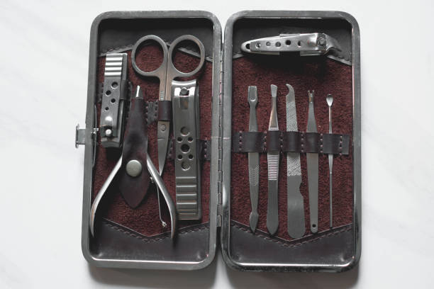 istock Manicure nails and pedicure tool set concept, cosmetic accessories for nails, scissors, pusher cuticle and nail file, cleaning nails for protection dirt bacteria in nails 2191081233