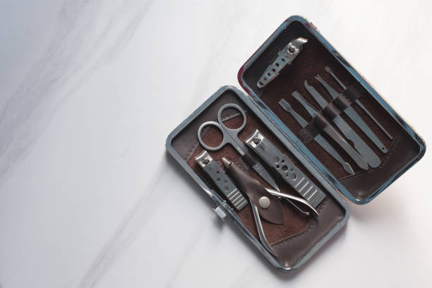 istock Manicure nails and pedicure tool set concept, cosmetic accessories for nails, scissors, pusher cuticle and nail file, cleaning nails for protection dirt bacteria in nails 2191081252
