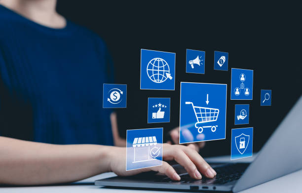 istock Online shopping and e-commerce technology internet concept. hands typing on a laptop surrounded by virtual icons representing e-commerce, online shopping, and digital marketing. Internet retail, 2191081941
