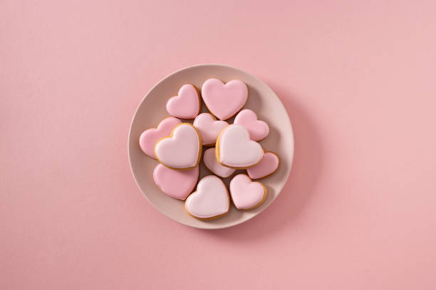istock Valentine's Day heart shaped pink glazed cookies. 2191083214
