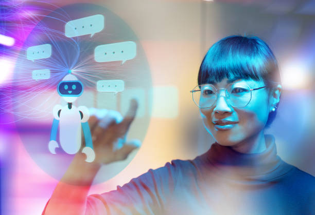 la mujer japonesa interactúa con una pantalla transparente futurista que muestra gráficos y datos digitales, simbolizando la inteligencia artificial, la tecnología avanzada y la innovación - bot-de-internet fotografías e imágenes de stock