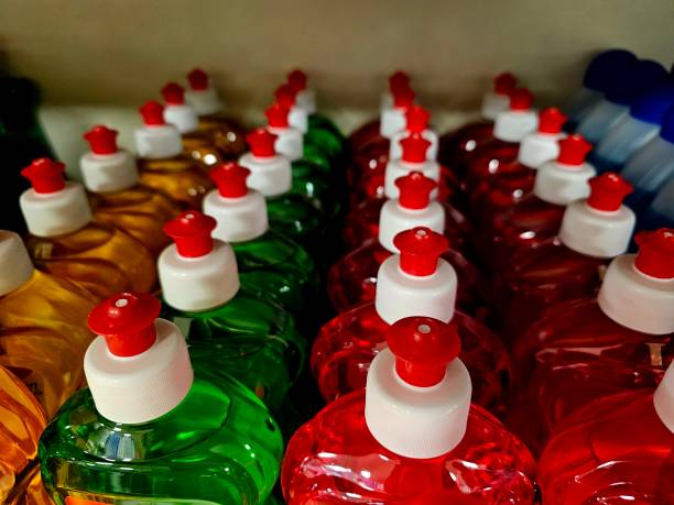 istock Close-up of detergent caps in various colors sorted on the shelf 2191087315
