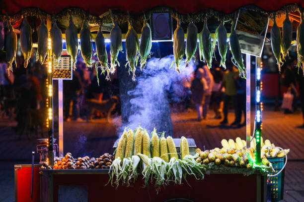 istock Food stand with cooked corn at night 2191087475