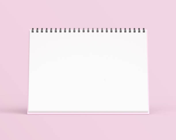 istock Empty desk calendar mockup on light pink background. 2191091878