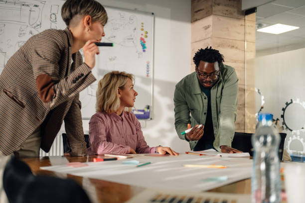 istock Marketing team analyzing diagrams and graphs during a meeting 2191092737
