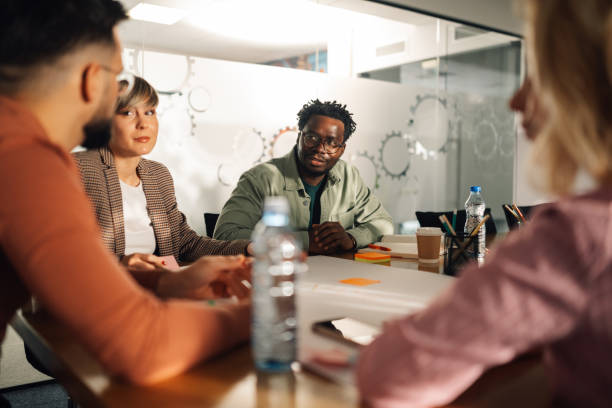 istock Diverse business team collaborating on project in modern office 2191092805