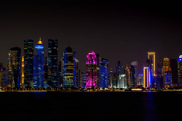 DOHA, Qatar - December 18, 2024: Skyscrapers of downtown Doha at night, Qatar.