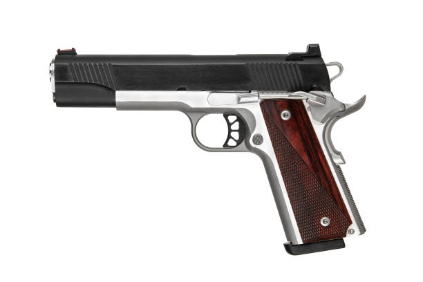 istock Modern semi-automatic handgun with wooden grips on a white background. 2191096473