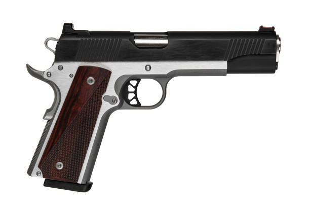 istock Modern semi-automatic handgun with wooden grips on a white background. 2191096475