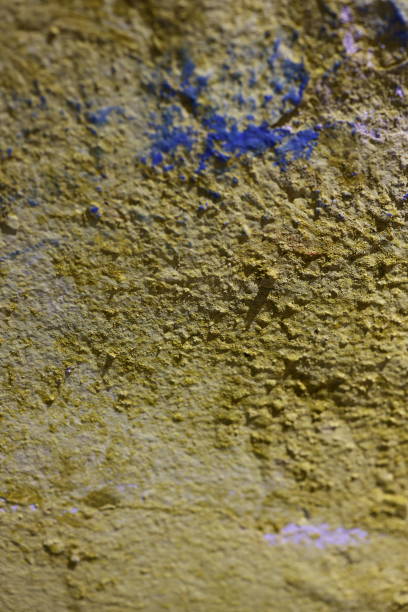 istock A Textured Wall that features a vibrant Yellow Varnish combined with Blue Accents 2191097504