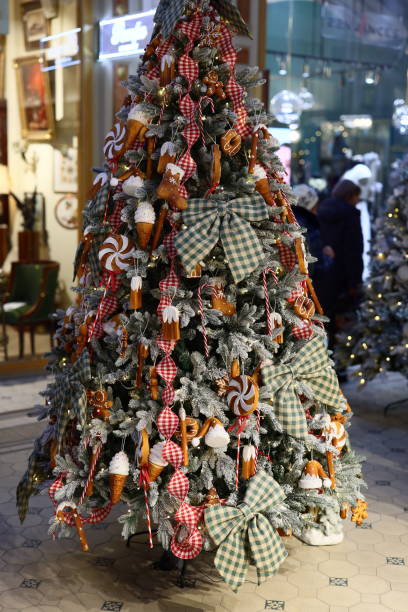 istock A Beautiful and Colorful Christmas Tree Adorned with Various Sweets and Decorative Ribbons 2191098955