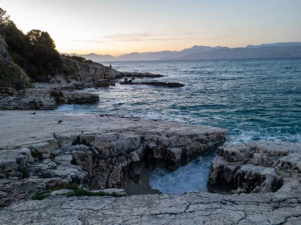 istock Coastal landscape at dusk with rocky cliffs. 2191104249