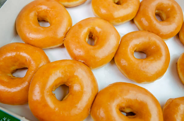 Dozen glazed doughnuts in a box in Ocean Springs Mississippi