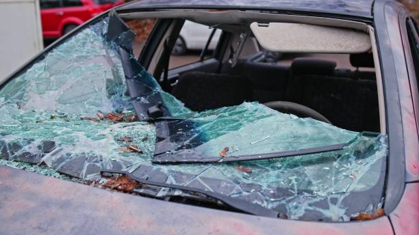 istock Damaged Car with Shattered Windshield from Road Accident Scene 2191108486