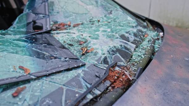 istock Damaged Car with Shattered Windshield from Road Accident Scene 2191108491