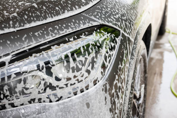 istock car cleaning and washing with foam soap 2191110441