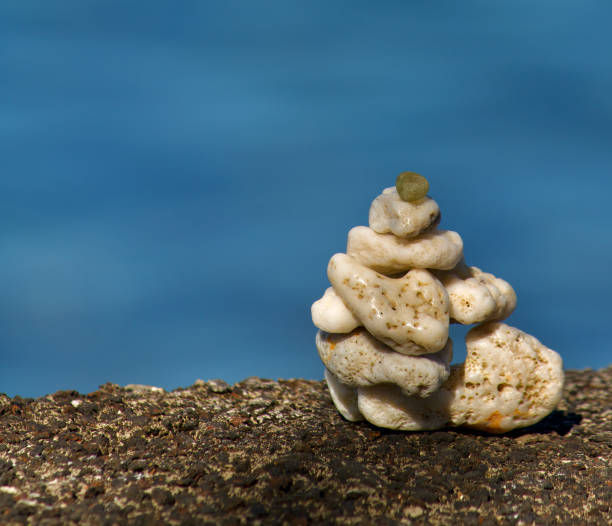 closeup view of Coral stones and seaglass stone balancing, this picture was taken near the seashore in Moroni Island in Comores.