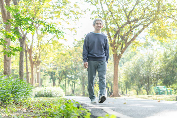 istock active asian senior man walking in the park,elderly lifestyle,exercising 2191115982