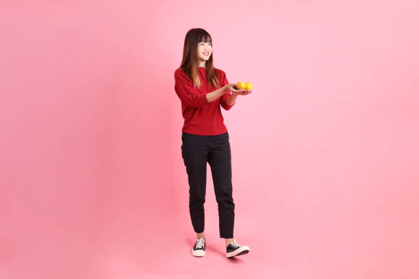 istock 20s woman in red t-shirt 2191118410