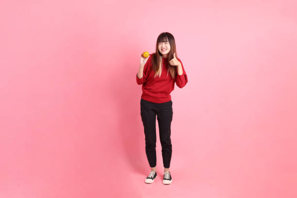 istock 20s woman in red t-shirt 2191118411