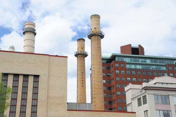 istock close up on old industrial smokestacks 2191120414