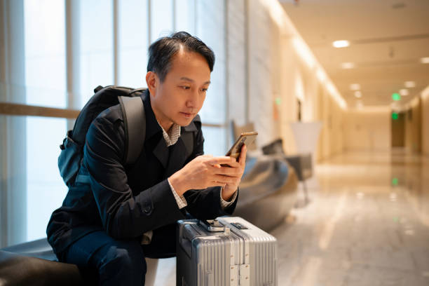 istock Asian middle-aged man in luxury hotel 2191120464