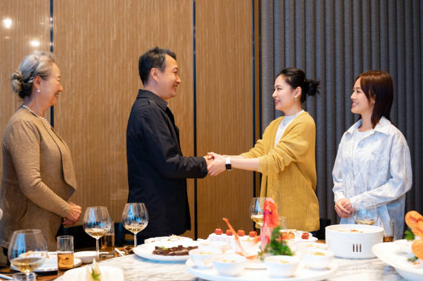istock Some Asian people attending a business banquet 2191120472