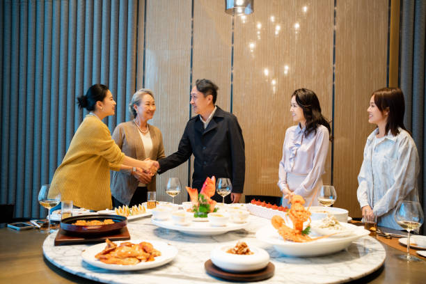 istock Some Asian people attending a business banquet 2191120515