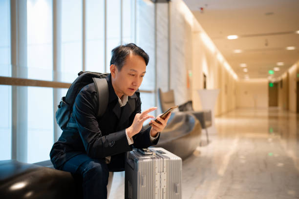 istock Asian middle-aged man in luxury hotel 2191120531