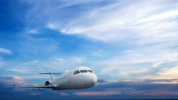 istock Commercial airplane flying in the sky with cloudscapes background 2191126898