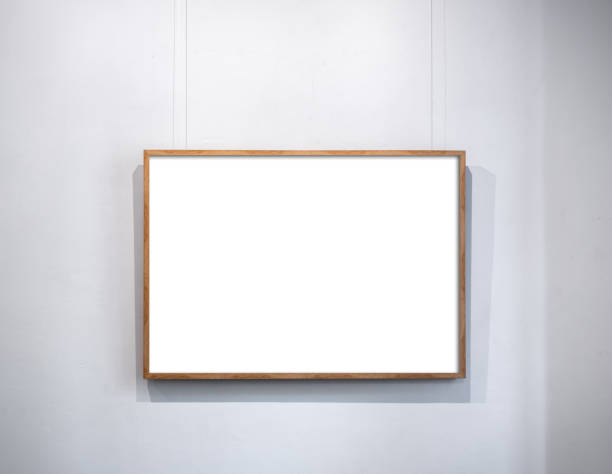 istock Mockup white blank space in thin wooden square picture frame, horizontal style, isolated. Empty single vintage brown rectangular simple photo frame hanging with nylon string on white wall background. 2191129162