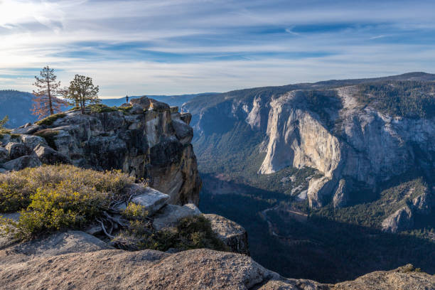 istock Hiking Taft Point with a view of Half Dome 2191129660