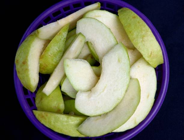 istock Cutting Guava Fruit - food preparation. 2191132919