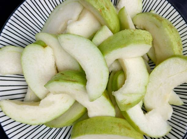istock Cutting Guava Fruit - food preparation. 2191132942