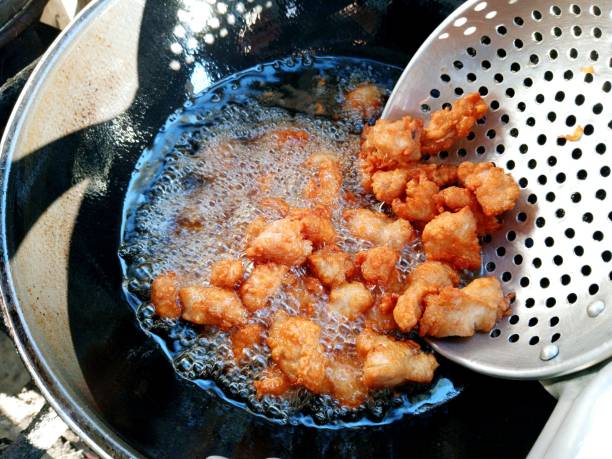 istock Cooking Deep fried Chicken Nuggets - food preparation. 2191133638
