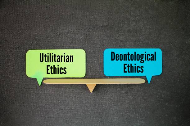 istock balance between the words Utilitarian Ethics and Deontological Ethics. ethical concept 2191134147