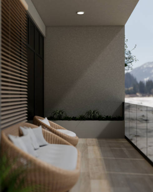 istock A side view of a modern, comfortable apartment balcony relaxation area featuring wicker sofas. 2191137083