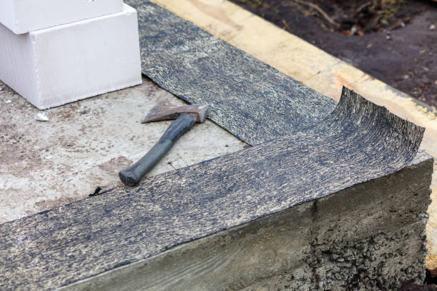 istock A hammer is laying on a brick wall 2191137265