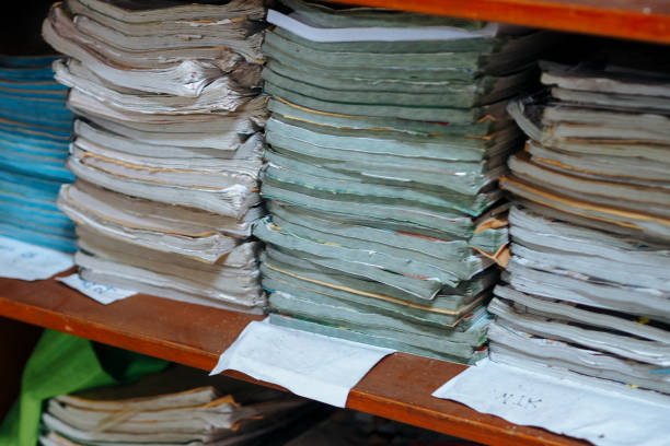 close up of stack of books on shelf