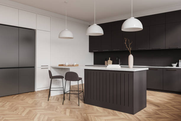 istock Modern kitchen interior with black cabinets, island, and wooden herringbone floor in contemporary home. 3D Rendering 2191140547