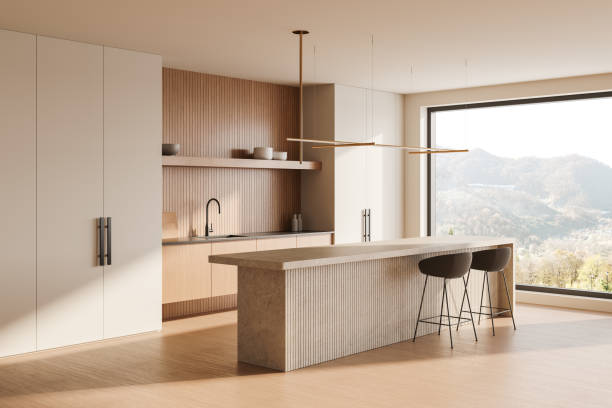 istock Modern kitchen interior with wooden accents and large window overlooking mountains. 3D Rendering 2191140582