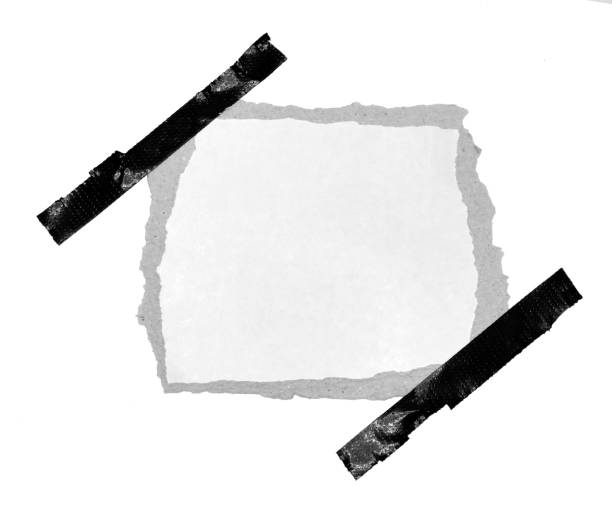 istock Masking tape on torn paper isolated on white background 2191146746