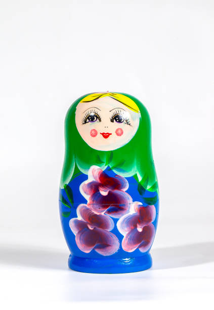 Bright colored nesting dolls on a white background. Russian national souvenir. Matryoshka. High quality photoBright colored nesting dolls on a white background. Russian national souvenir. Matryoshka.