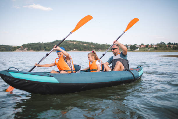istock Dad with kid paddling kayak 2191152507