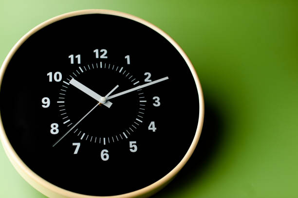 istock Clock telling time and scheduling appointments. Work goals. Photo of an alarm clock in a studio. 2191155381