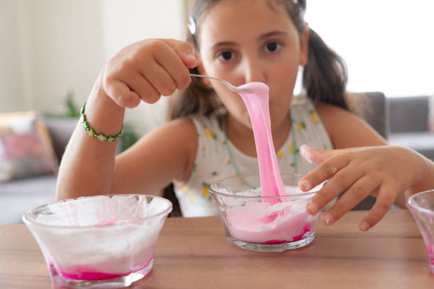 istock Girl playing with sticky slime 2191155702